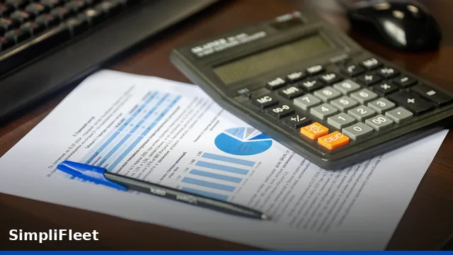 A financial director reviewing fleet management software costs on a dashboard, representing cost modeling and expense tracking.